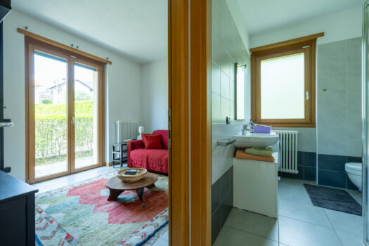 Three-room apartment with garden in Tremezzina – residence with swimming pool
