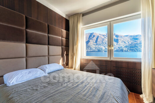 Modern lakefront villa with a large garden