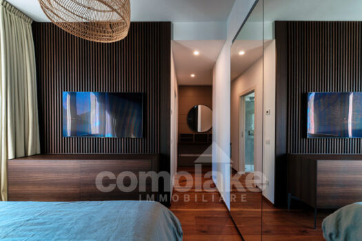 Modern lakefront villa with a large garden