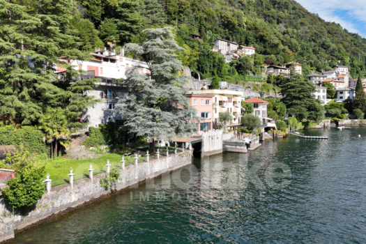 Modern lakefront villa with a large garden