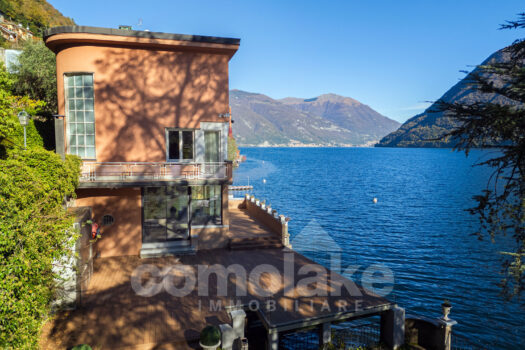 Modern lakefront villa with a large garden