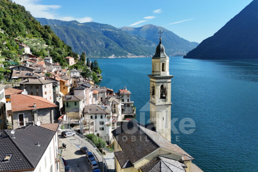 Modern lakefront villa with a large garden