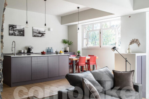 Open-plan apartment in a historic villa in downtown Cernobbio