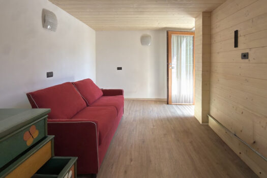 Stone house with a garden on a hillside in Menaggio