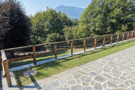 Stone house with a garden on a hillside in Menaggio