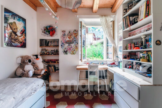 Casa di lago con giardino a Torno